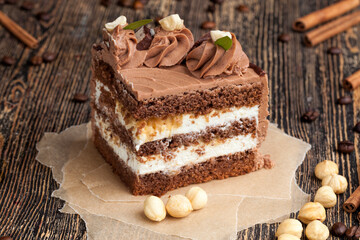 piece of layered cake with nuts and caramel