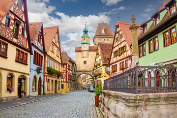Rothenburg ob der Tauber famous street view. Traditional Bavarian houses in Germany. - obrazy, fototapety, plakaty