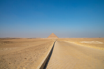 Fototapeta na wymiar View of the desert, road and sky from the Red Pyramid of Dashur. Egypt.