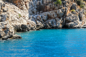 Brown gulet moored in Aegean Sea - Ölüdeniz Beach and aquarium kyou, Ölüdeniz Beach Turkey's best beaches - Fethiye, Turkey