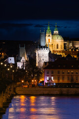 Fototapeta na wymiar Evening Prague, view of the old town, reflection of the lights of the night city