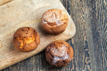 fresh cottage cheese cupcake on a wooden table