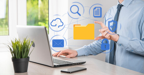 Document Management System DMS .Businessman hold folder and document icon.Software for archiving, searching and managing corporate files and information.Internet Technology Concept.Digital security