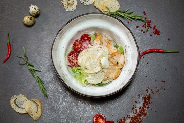 Caesar with chicken Chicken fillet, lettuce leaves, caesar sauce, cherry tomatoes, parmesan cheese, quail egg