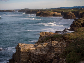 Las Catedrales beach, Ribadeo, Galicia, Spain. Vertical view of coastline and Las Catedrales beach in the background.