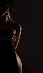 Beautiful female hip bend on black background