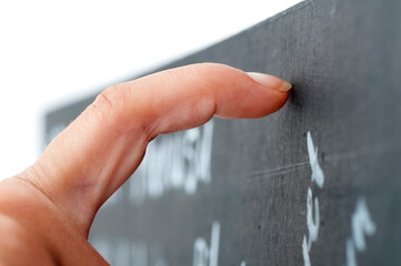 Long nail on chalkboard.