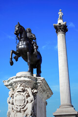 Charles I statue completed in 1663 and Nelson’s Column in Trafalgar Square London England UK...