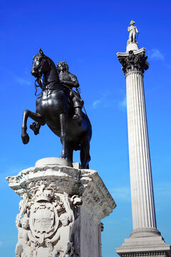 Charles I statue completed in 1663 and Nelson’s Column in Trafalgar Square London England UK which are popular travel destination tourist landmark attractions, stock photo image