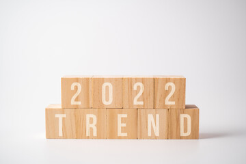 Year 2022 trend on wood block. Business concept.