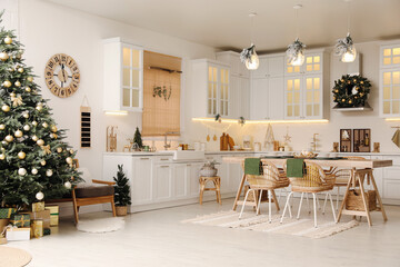 Cozy open plan kitchen decorated for Christmas. Interior design