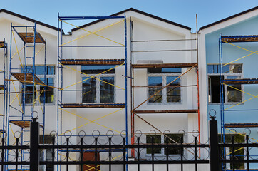 The progress of construction of the kindergarten building. Modern decoration of building facades