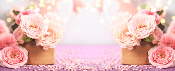 A bouquet of delicate pink roses. Festive card with pink flowers on a light background, web banner...