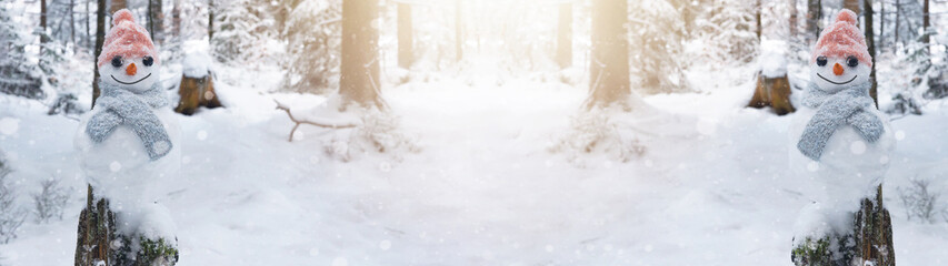 Winter snow snowman background panoramic banner panorama - Little cute Snowman sits on tree trunk with snow in snowy forest with snowflakes and sunshine