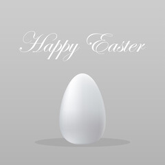 Easter egg on a gray background with a gradient and the inscription happy Easter.