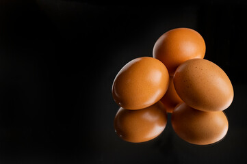 eggs on black background