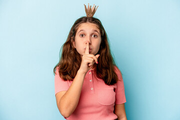 Little caucasian girl wearing a princess crown isolated on blue background keeping a secret or...