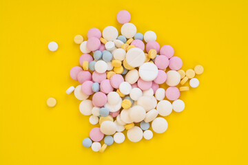 Colored pills for toothache or minstrual pain