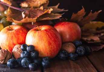 Naklejka na ściany i meble Still life of fruits and berries on a wooden table