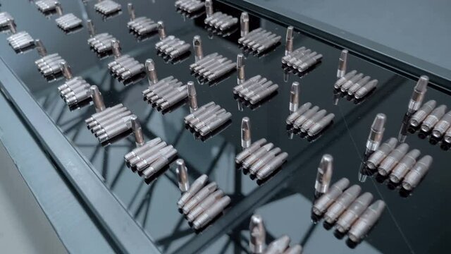 Sets of new copper, current, contact tips for spot welding. Shot in motion. Closeup
