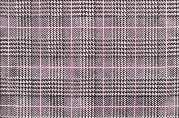 Black, white and pink tartan texture background. houndstooth pattern. Textile and texture concept