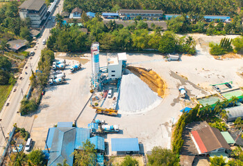 Aerial top view of factory industry. Electricity tower building in energy, transportation, logistic or environment concept. Manufacturing workshop station.