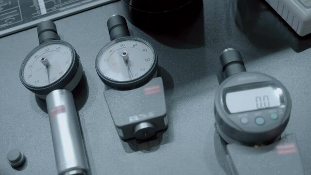 Digital and analogue hardness testers for testing the hardness of the following materials: natural rubber chuk, neoprene, polyester, PVC, leather, thiokol, BNK, wax, vinyl, cellulose acetate, polystyr