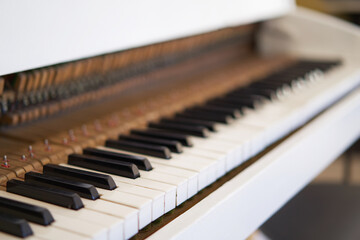 Fototapeta na wymiar Old Piano, keyboard keys shot across the piano keys
