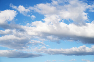 blue sky background with tiny clouds