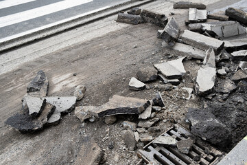 City street asphalt demolition for reconstruction, Crushed top layer surface of asphalt