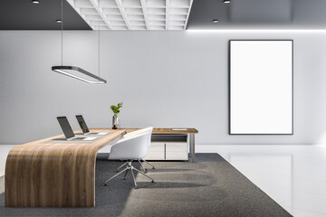 Modern office interior with empty white mock up poster, concrete walls and floor, furniture, equipment and daylight. Workplace concept. 3D Rendering.