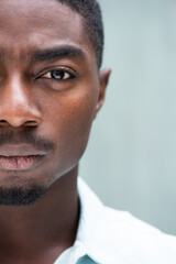 Obraz premium Close up handsome half face African American man