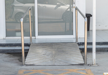 Building entrance trail with ramp for elder old or cannot self help disability person on wheelchair.