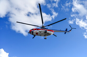 The civil helicopter over the sea