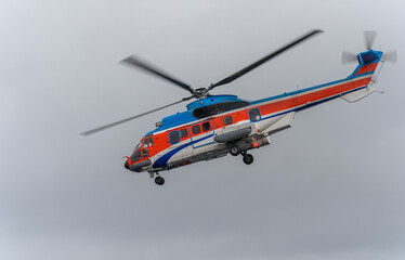 The civil helicopter over the sea