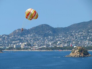paragliding on the beach, Acapulco, Mexico