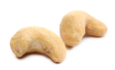 Salted cashew nuts isolated on white  