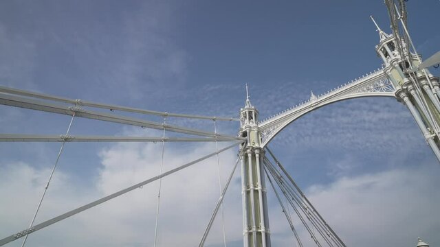 Ornate ironwork of Albert Bridge over the River Thames, Battersea, London