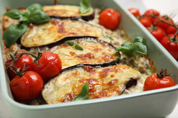 Delicious eggplant lasagna in baking dish, closeup