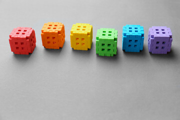 Multicolored cubes on a gray background