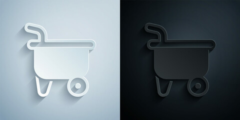 Paper cut Wheelbarrow icon isolated on grey and black background. Tool equipment. Agriculture cart wheel farm. Paper art style. Vector