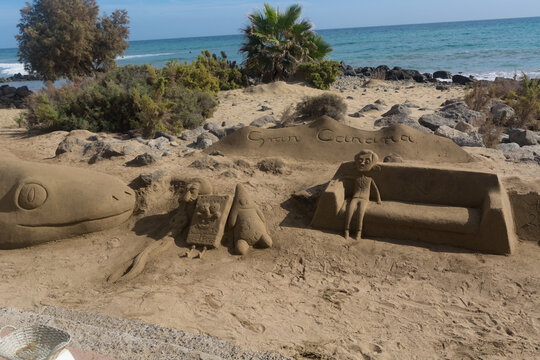 CRAN CANARIA, MELONERAS - 13. NOVEMBER 2019:
Sand sculptures on the beach of Meloneras, Spain with inscription Gran Canaria