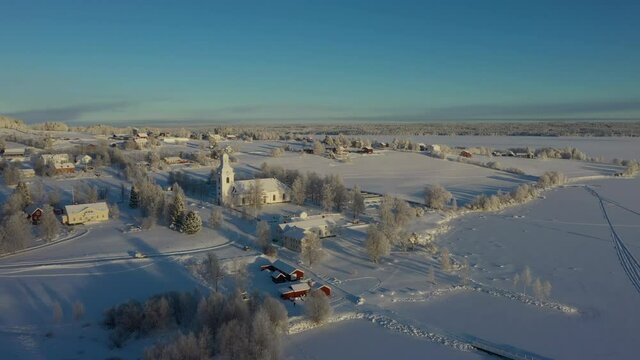Aerial view of a village in northern Sweden in cold winter weather