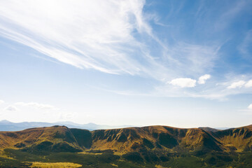 Naklejka na ściany i meble Beautiful mountain landscape on sunny day. Drone photography
