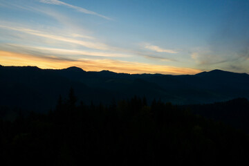 Silhouette of mountain landscape at sunset. Drone photography