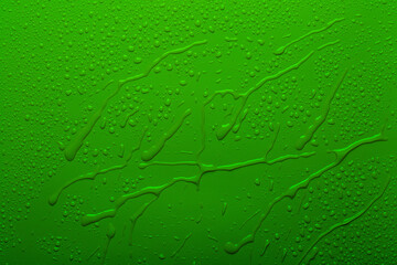 Water drops on green color  surface