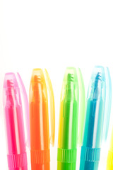 set of colorful markers on white