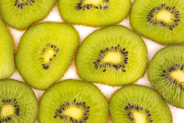 sliced ​​kiwi fruit slices on a white background