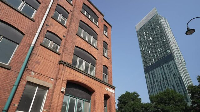 301 Deansgate from historic red brick buildings, Manchester, Lancashire