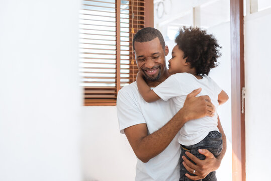 African American Boy kissing Father, Happy Black family concept, Father day.